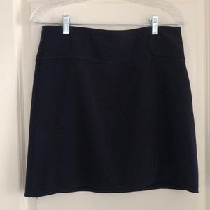 Navy skirt with side zip and detailing on front